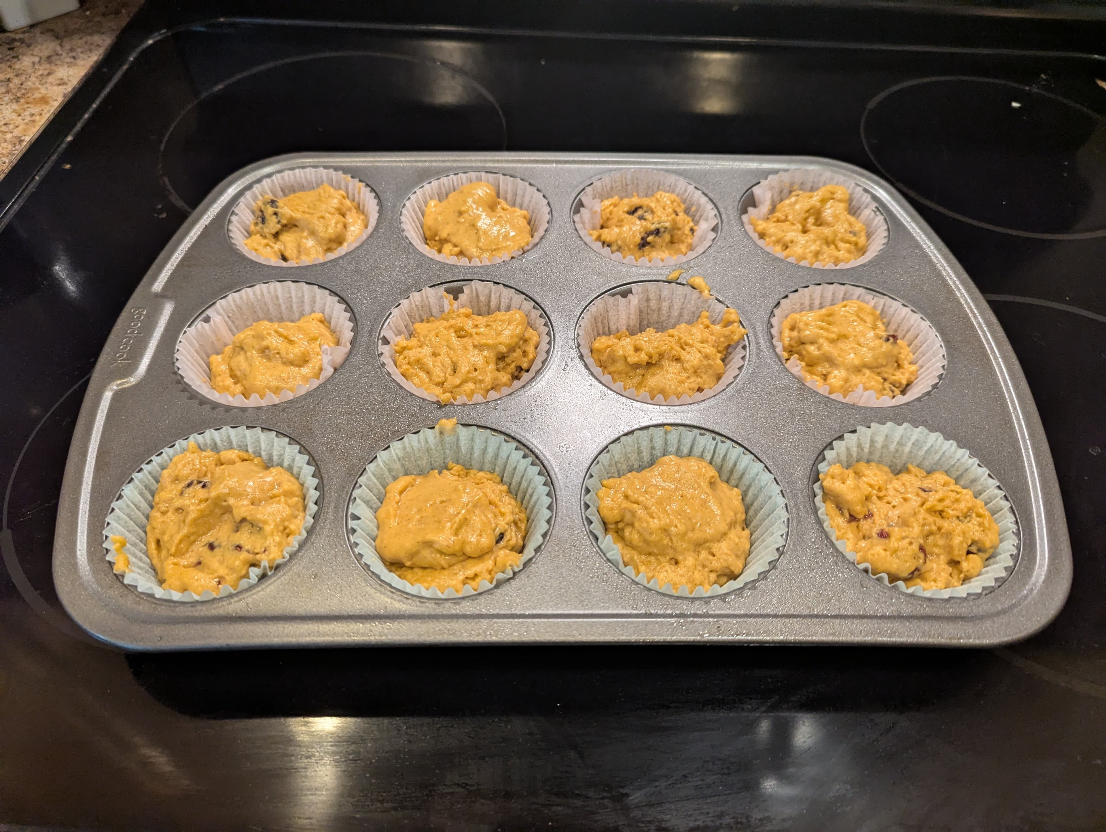 Raw batter in muffin pan